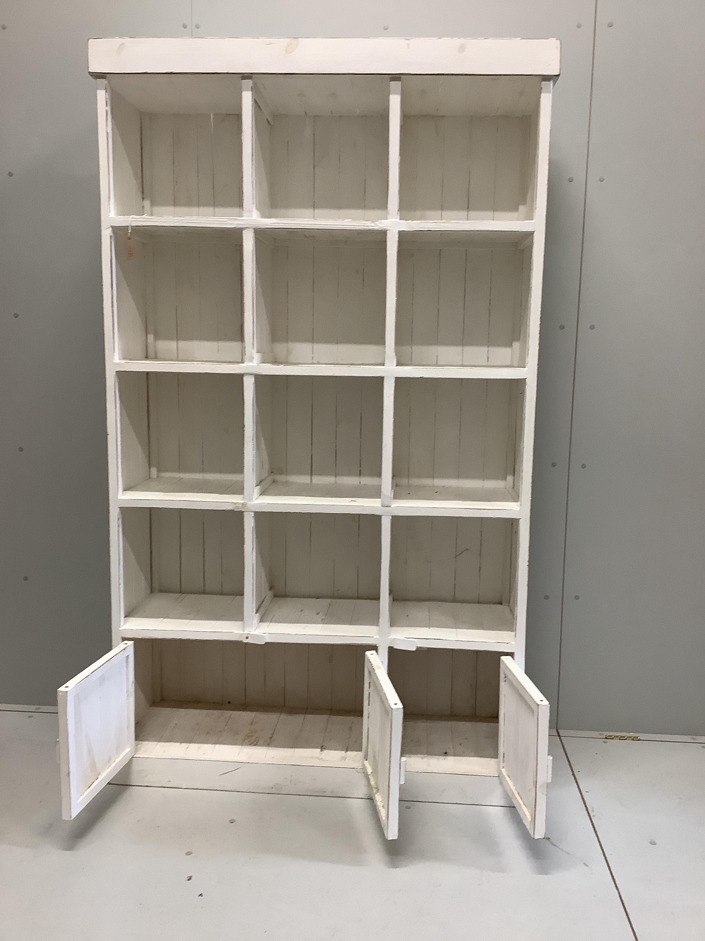 A painted pine pigeonhole unit, width 119cm, depth 39cm, height 201cm